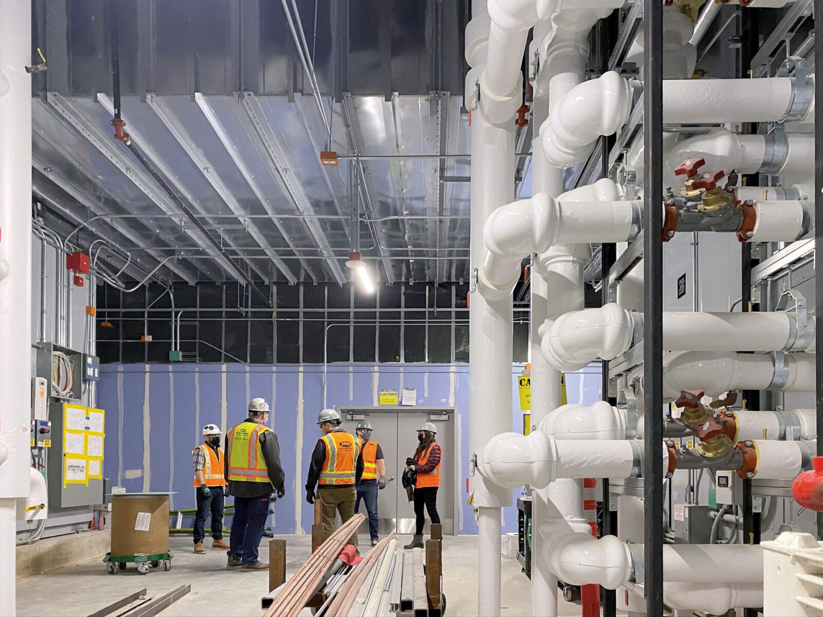 MacDonald-Miller employees at sitewalk of the Seattle Convention Center